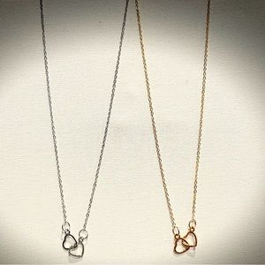 Minimalist double heart necklace